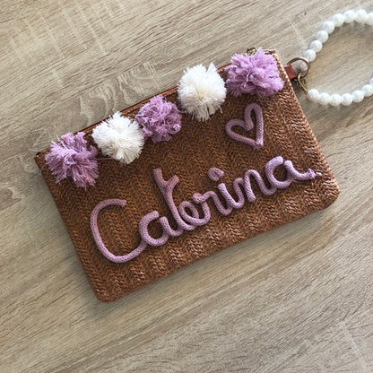 Pochette in paglia con nome in tricotin