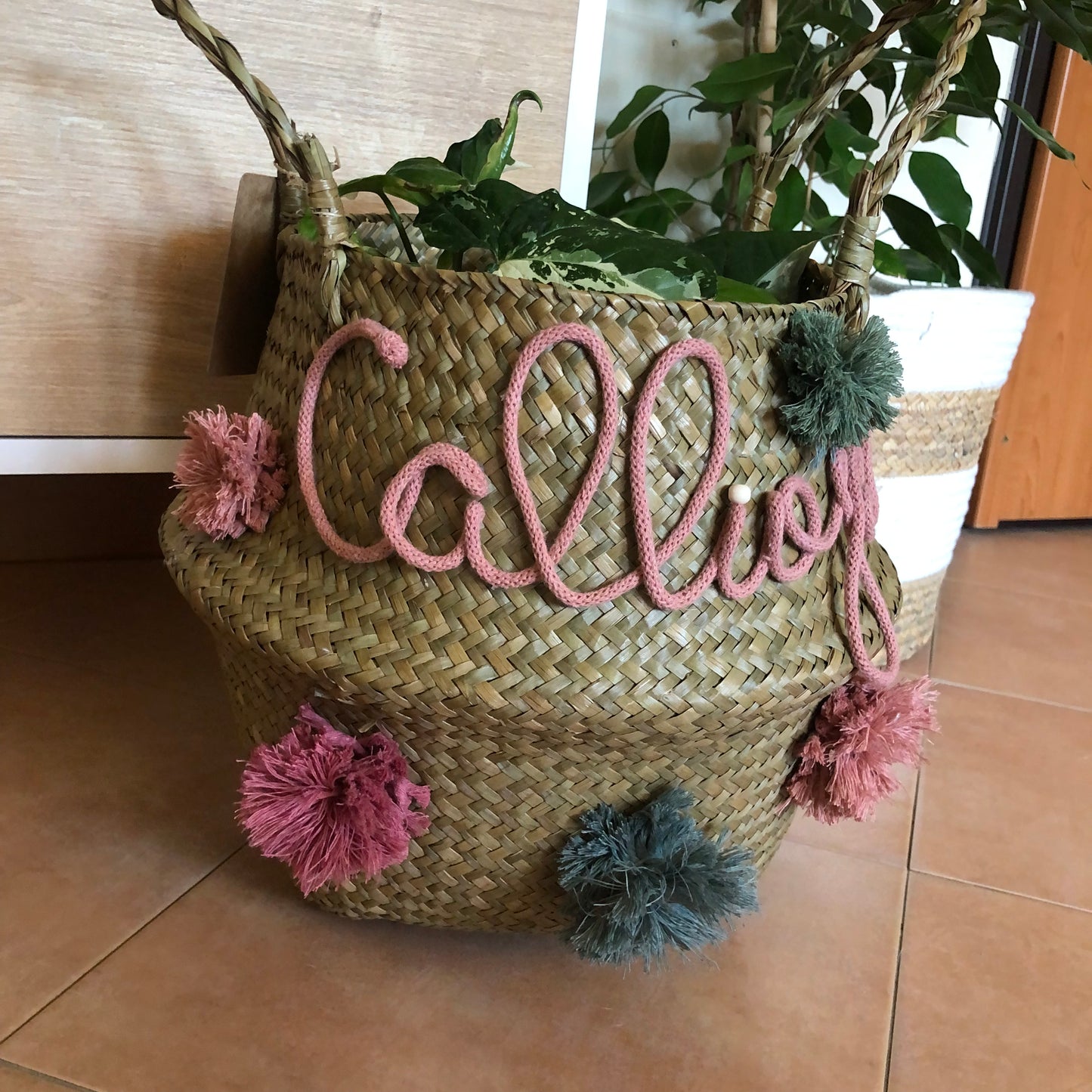 Wicker basket with name and pom pom